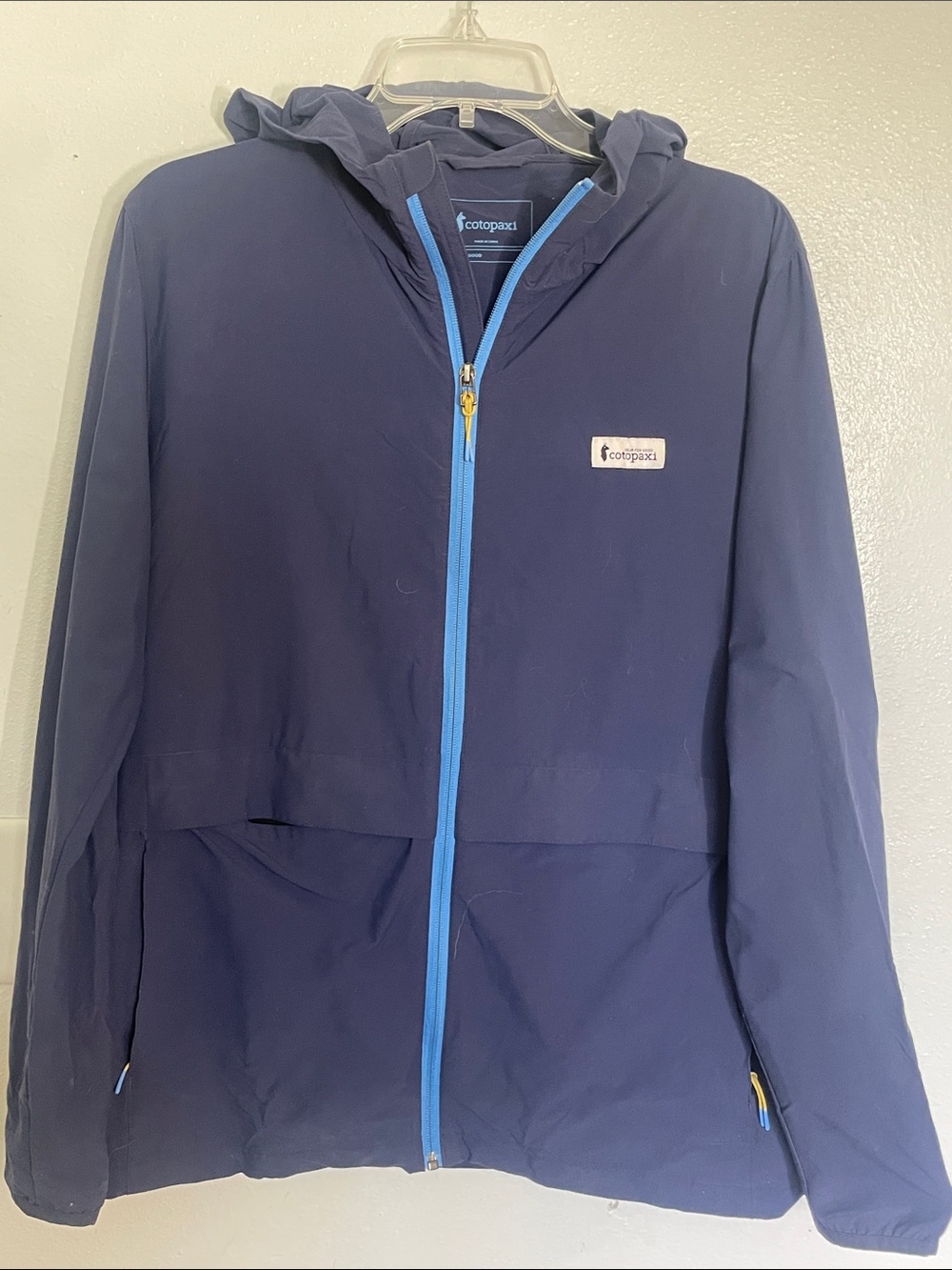 cotopaxi Navy Raincoat with Bright Blue Zipper